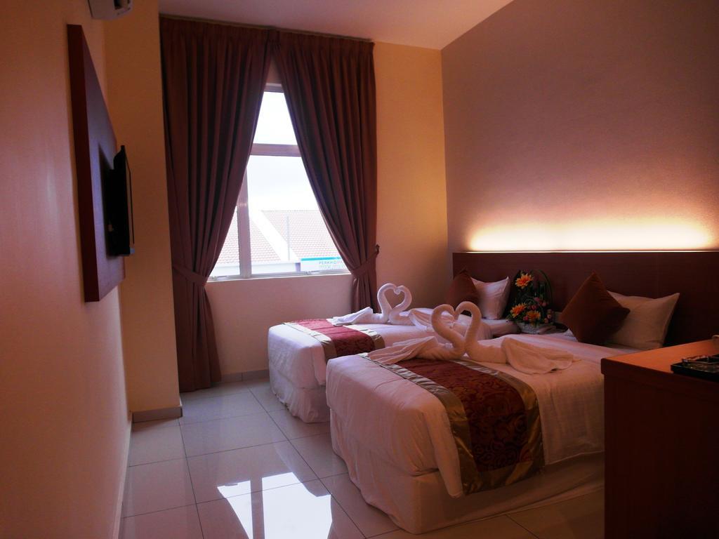 Supreme Hotel Malacca Habitación foto