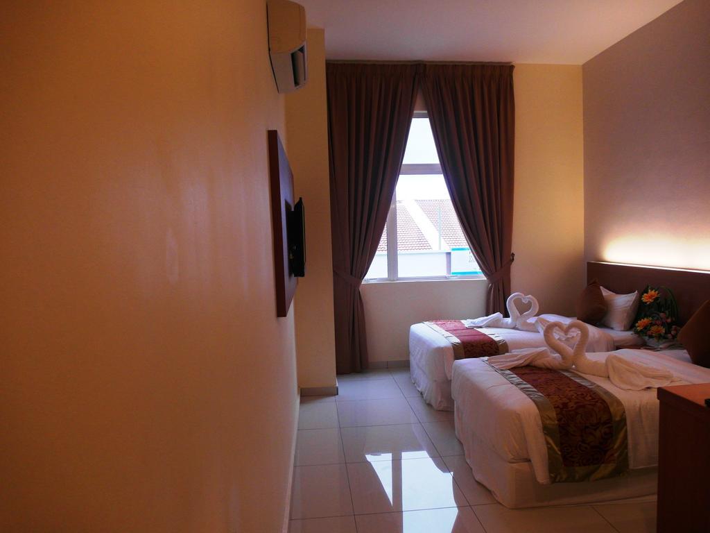 Supreme Hotel Malacca Habitación foto