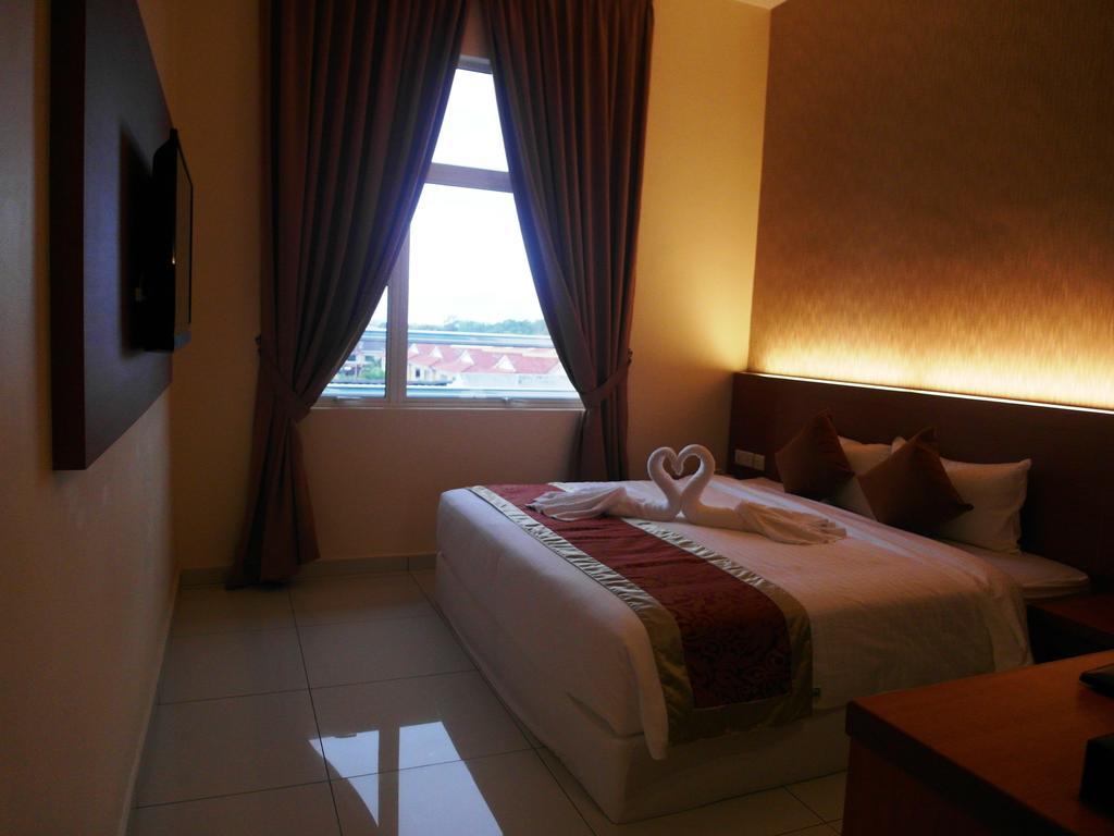 Supreme Hotel Malacca Habitación foto